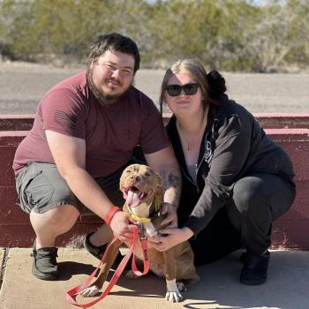 Adopters with dog adopted during Bring Love Home Challenge