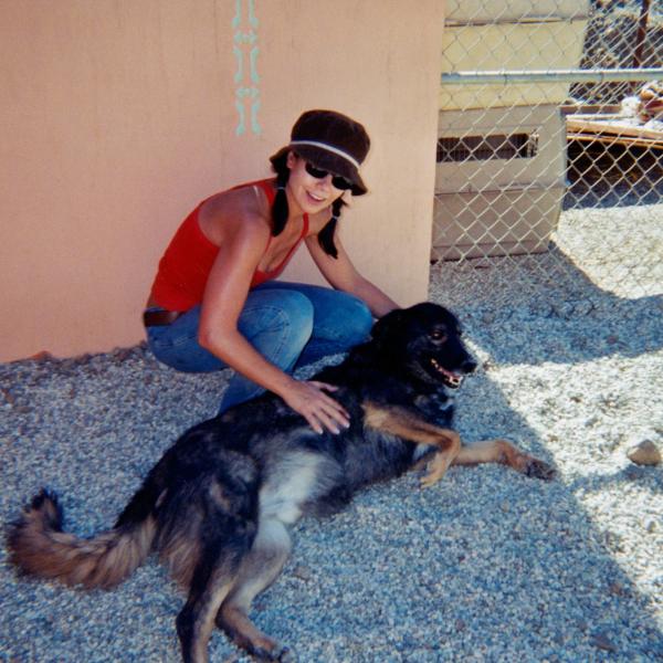 A Brigade volunteer takes a snuggle break, 2001.