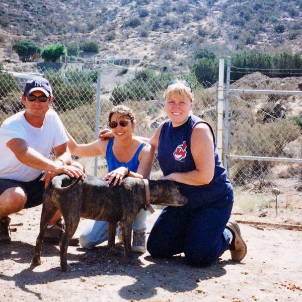 LA Brigade volunteers take time to give a rescue some love, 2002.