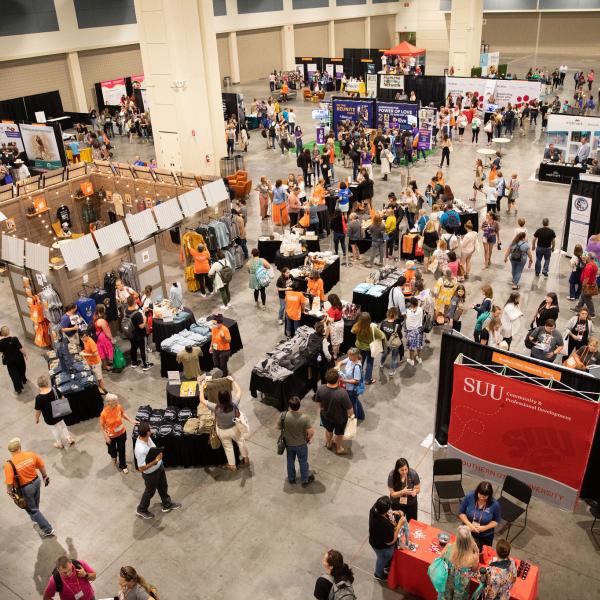 Conference attendees visit the vendor hub in Raleigh, 2022.