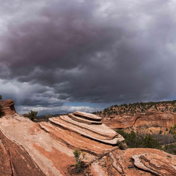 Cliffs from Angel Canyon with blue sky and clouds above