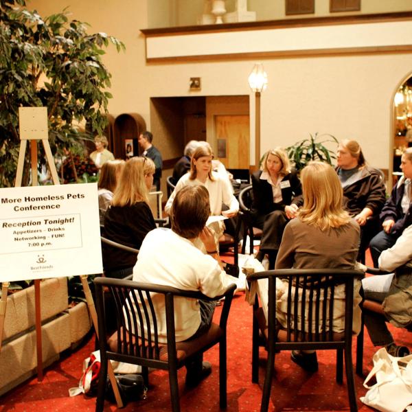 Conference attendees share ideas in Cincinnati, 2004.