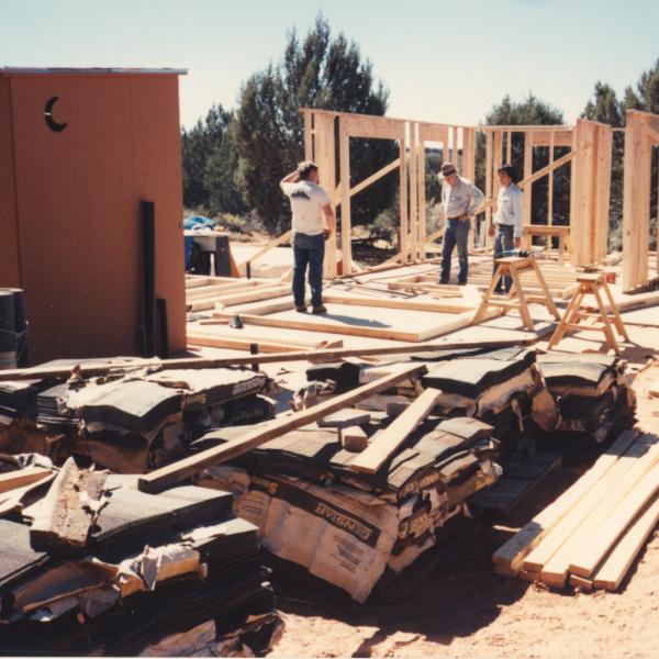 David Maloney, son of co-founder Faith Maloney, strategizes with co-founders John Fripp and Steven Hirano. (probably original clinic, around 1990)