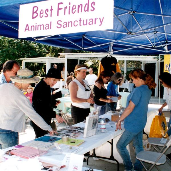 Volunteers table at the Los Angeles Equestrian Center Benefit, 1999.