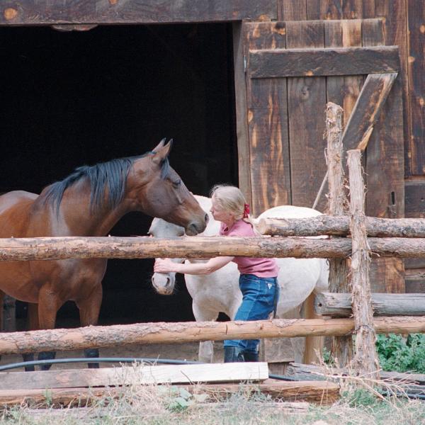 Co-founder Diana Asher at the Disney Barn with horses True and Sparkles.