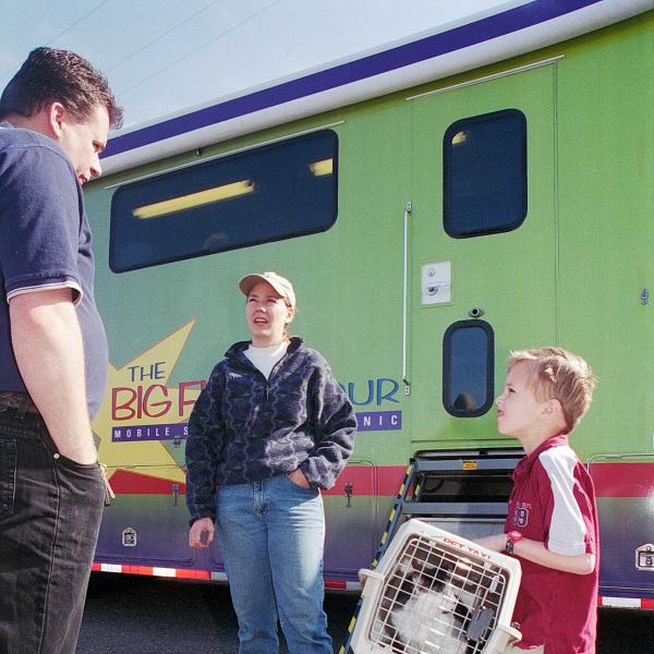 Julie Castle works at The Big Fix mobile clinic in Provo, Utah, 2001.