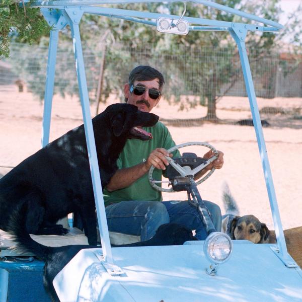 Co-Founder Tyson Horne always had some pooch passengers on his golf cart trips.
