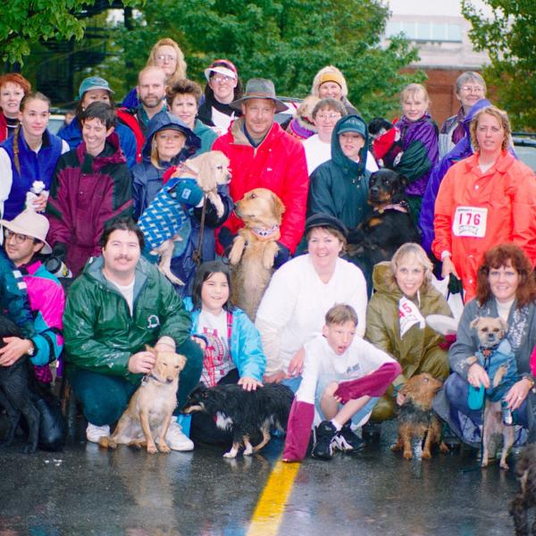 Strut Your Mutt participants pose for a group photo after the race, 1996.