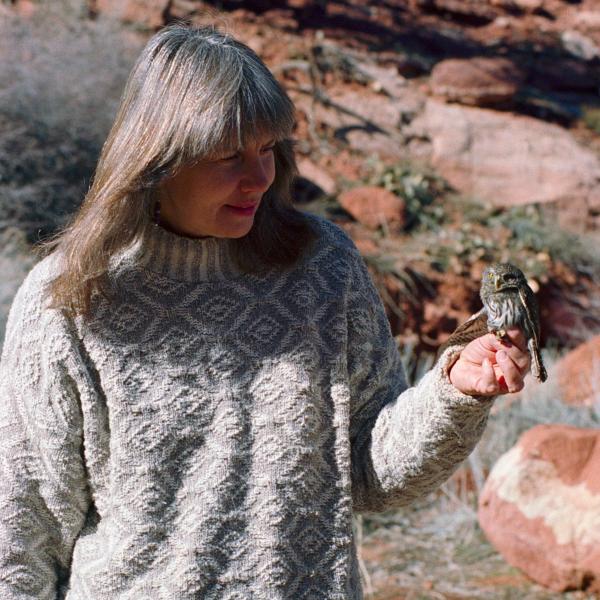 Co-founder Sharon St. Joan ready to release a wild Northern Pygmy Owl, 1997.