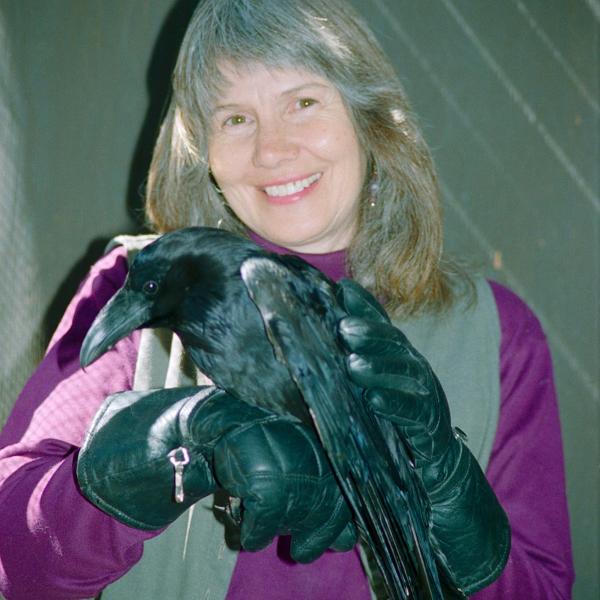 Co-Founder Sharon St. Joan with a raven.