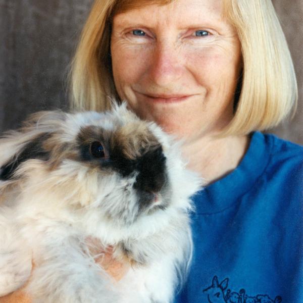 Co-founder Chandra Forsythe holding Nutter Butter the rabbit.
