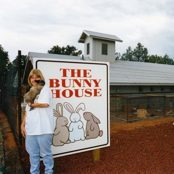 Co-Founder Chandra Forsythe in front of Rabbit Redford’s Retreat, newly named The Bunny House.