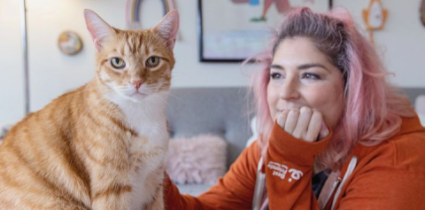 Samantha Bell with an orange cat